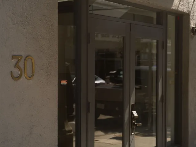 Street entrance marked with a gold 30 at Coastal Therapy Group's Pasadena therapy office on N. Raymond Ave