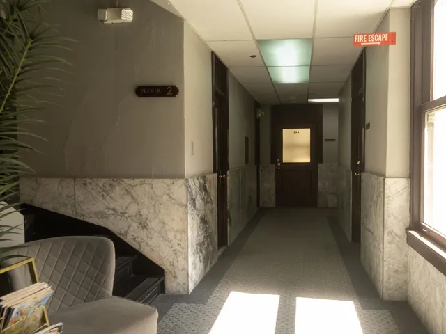 Sunlit second-floor hallway leading to Coastal Therapy Group's Pasadena office